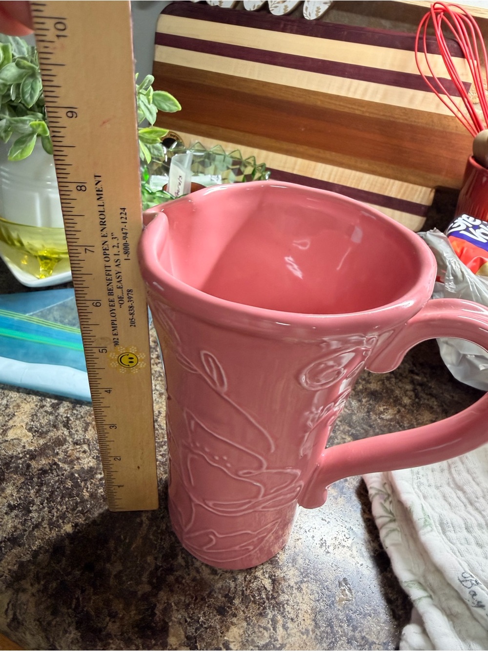 Pink Ceramic Pitcher with Decorative Relief